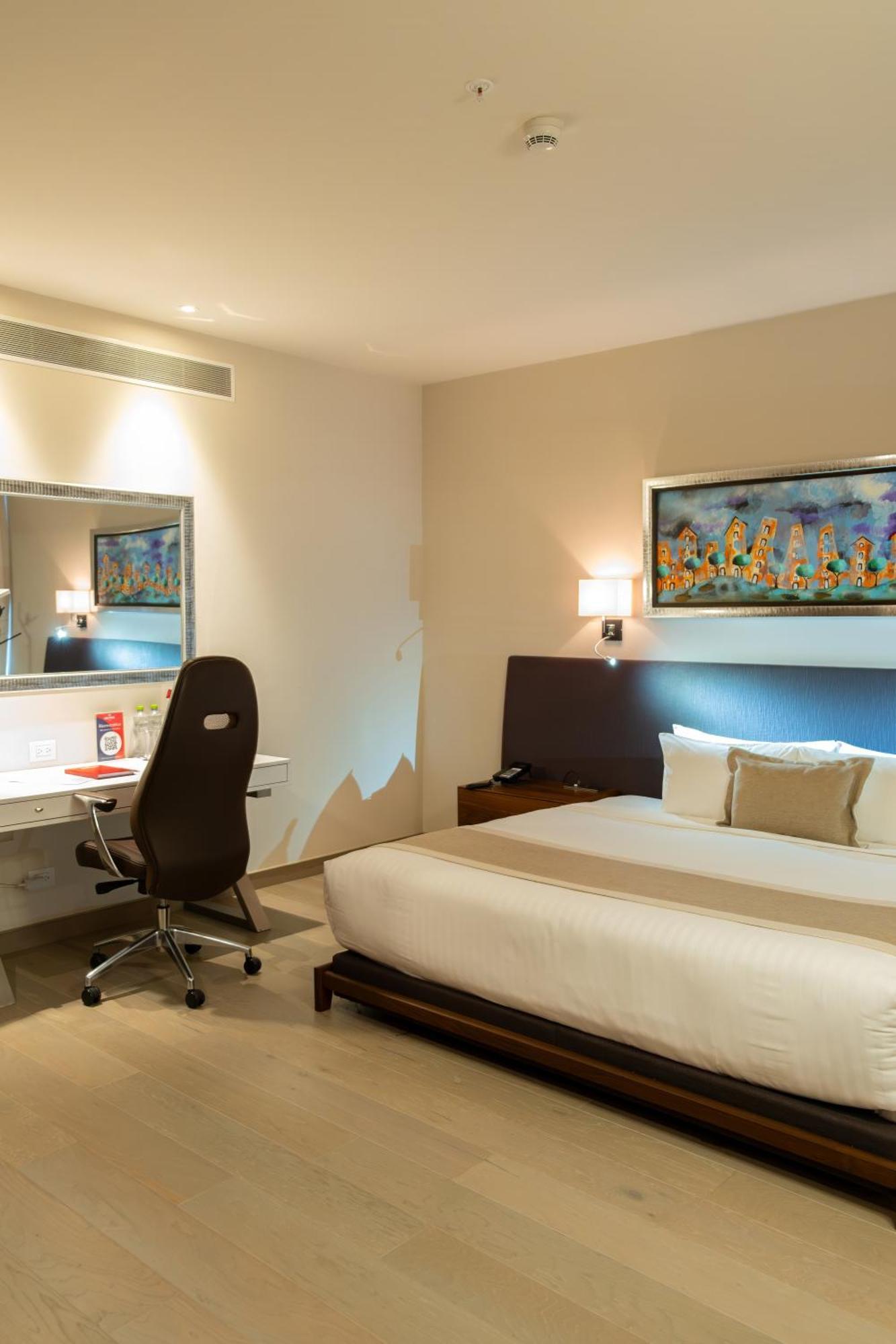 Metria Hotel Леон Экстерьер фото A room at the hotel