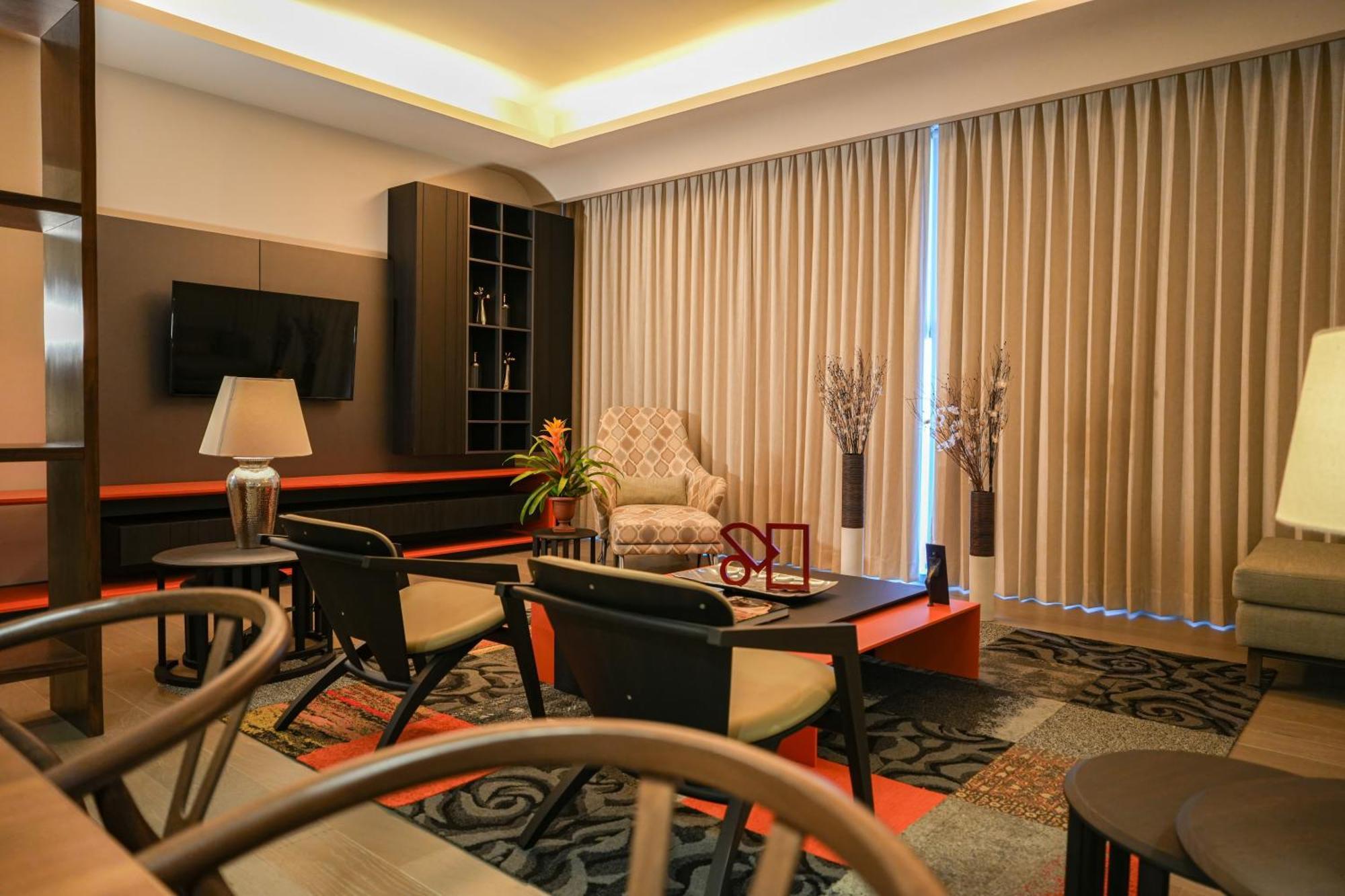 Metria Hotel Леон Экстерьер фото A living room in a condominium